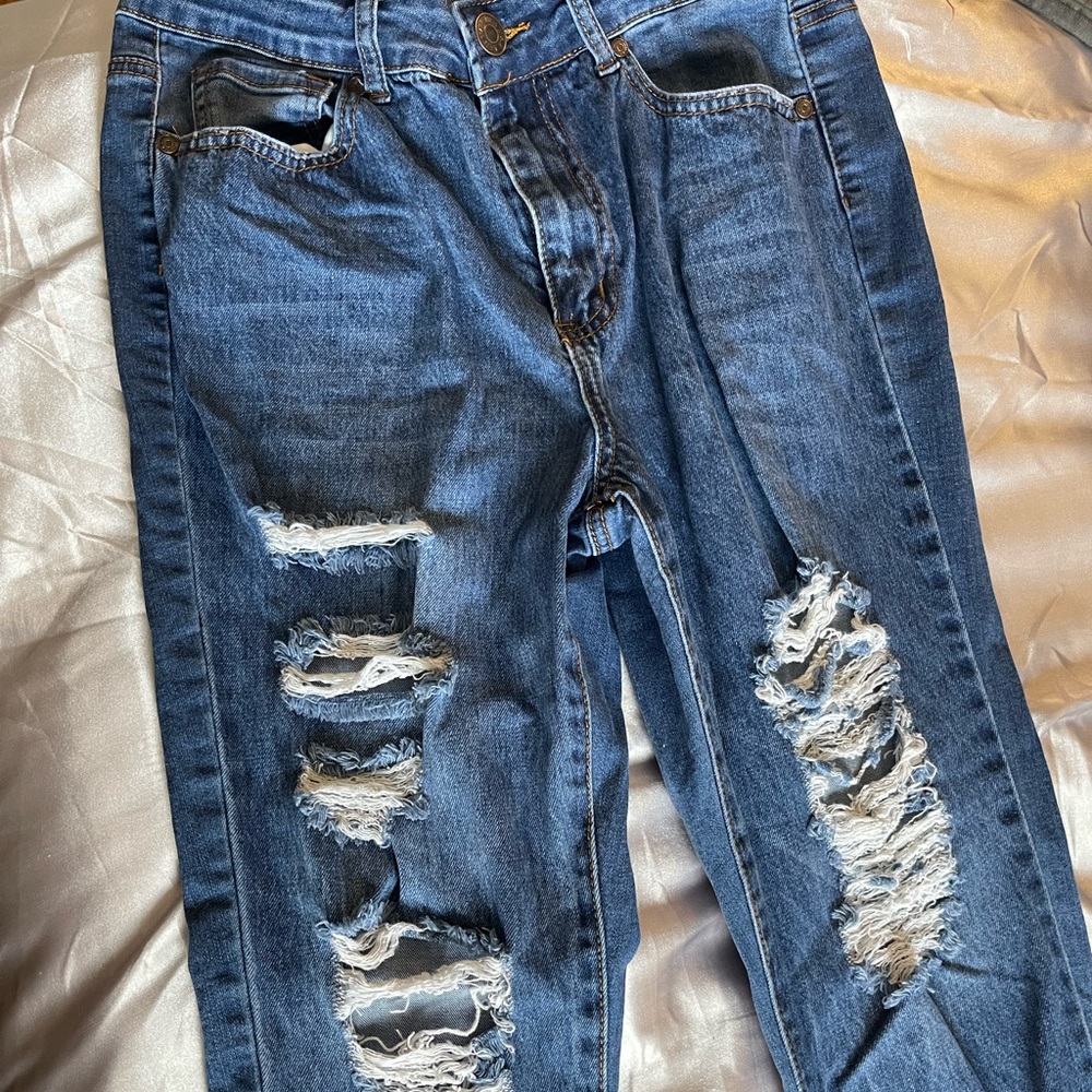 Higher waist distressed skinny jeans